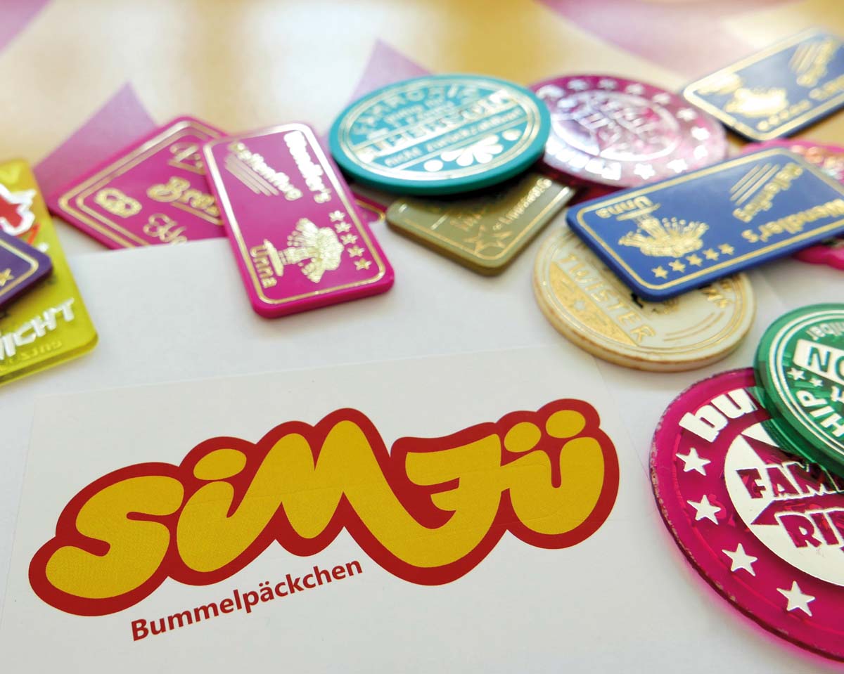 Auf die Bummelpäckchen, fertig und los ... das Gewinnspiel zu Sim-Jü 2023 startet. Fotos: Stadt Werne